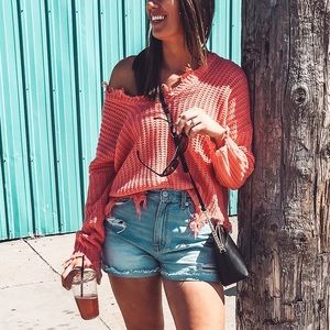 Orange distressed sweater